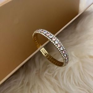 Adjustable pink and white bracelet